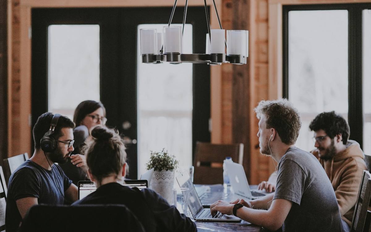A business meeting representing commercial partnerships